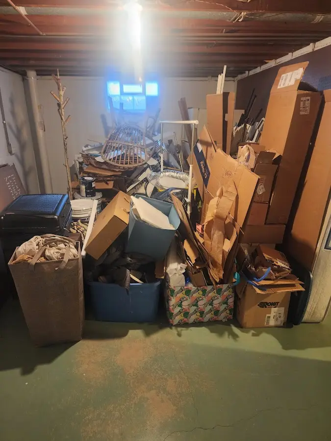 Roll-off dumpster container at job site for 4 Yard Dumpster Rental in Bemidji